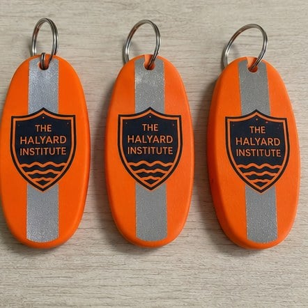 Customized floating keychains for swim schools and aquatic centres